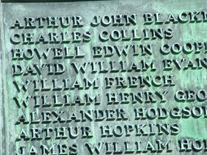 Inscription plaque displaying verdigris and error in spelling of 3rd surname down © Dinas Powys Community Council, 2010