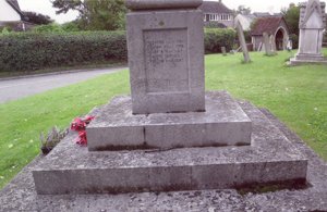 The memorial before cleaning with lettering difficult to read and moss on joints © D Slade, 2010