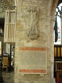 The memorial plaque with sculpture above © St Mary & St Nicolas PCC, 2011