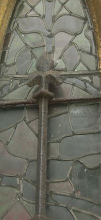 The ferramenta on the exterior of the window before grant works © All Saints' Church Hoby, 2010
