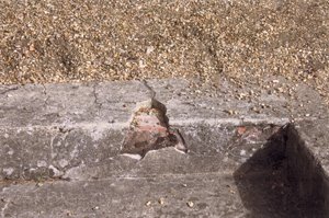 Damaged concrete render prior to works © Grundisburgh & Culpho Parish Council, 2009