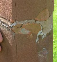 One of the inappropriate previous repairs to the memorial which required replacing © Wybunbury War Memorial Action Committee, 2010