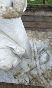 Detailing of sculpture after cleaning showing instruments of war © Elliott Ryder Conservation, 2010