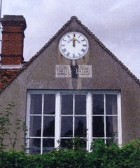 Burrough Green war memorial clock on the school © Burrough Green Parish Council, 2009