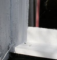 Crantock war memorial hall window before repair © Crantock Parish Council, 2009
